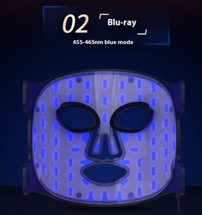 LED face mask lit up in cool blue light