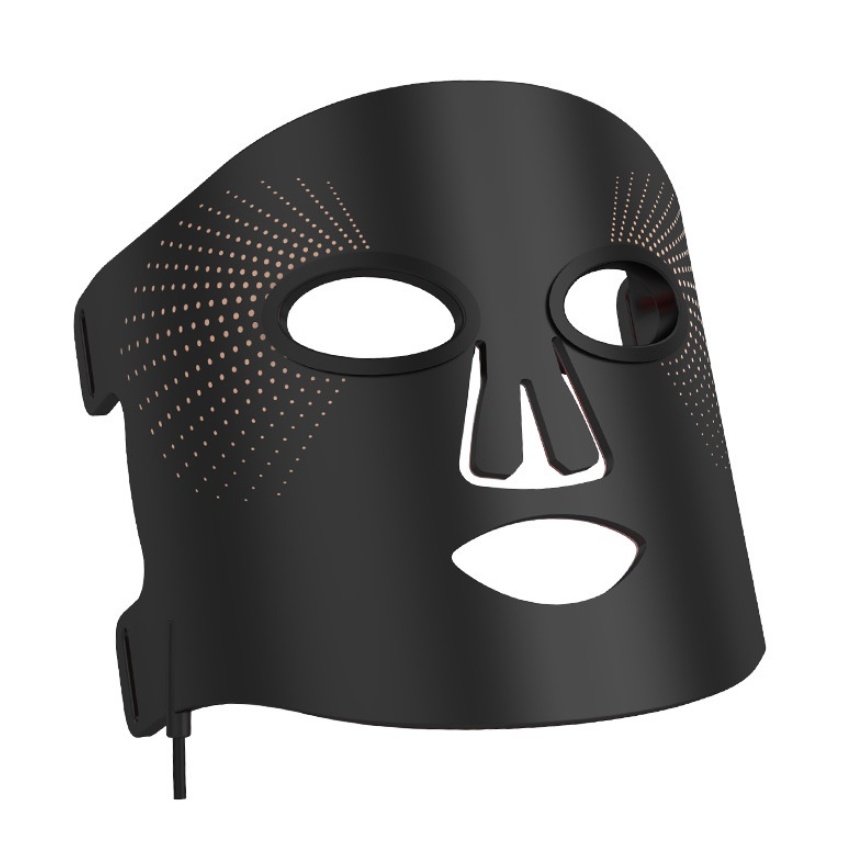 Black silicone LED face mask shown at an angle with its charging cable
